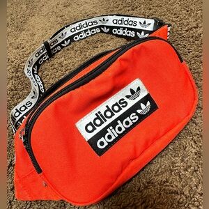 Adidas Originals belt bag in orange color